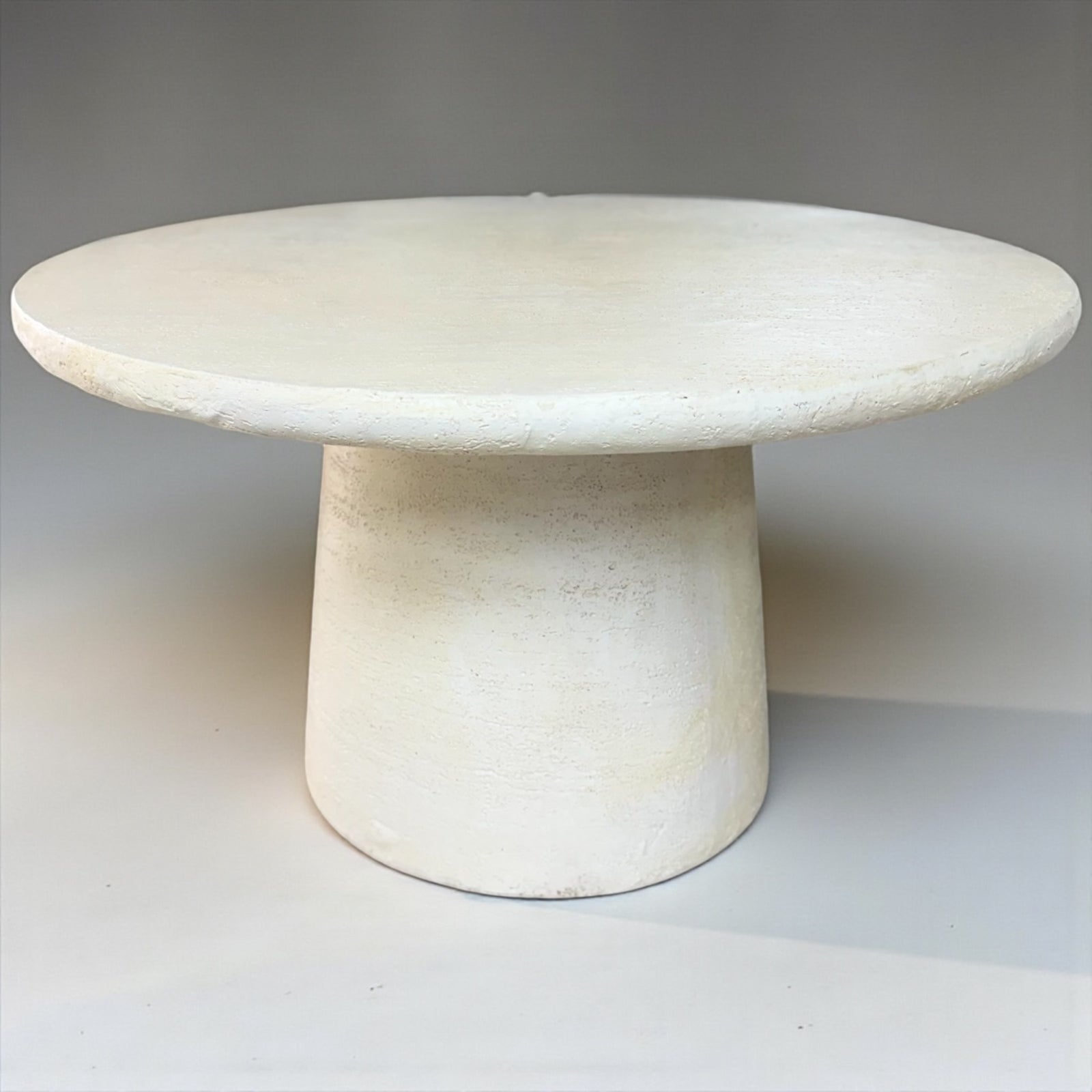 Faux Stone Pedestal Round Coffee Table