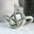 Interlocking Silver Rings Table Top