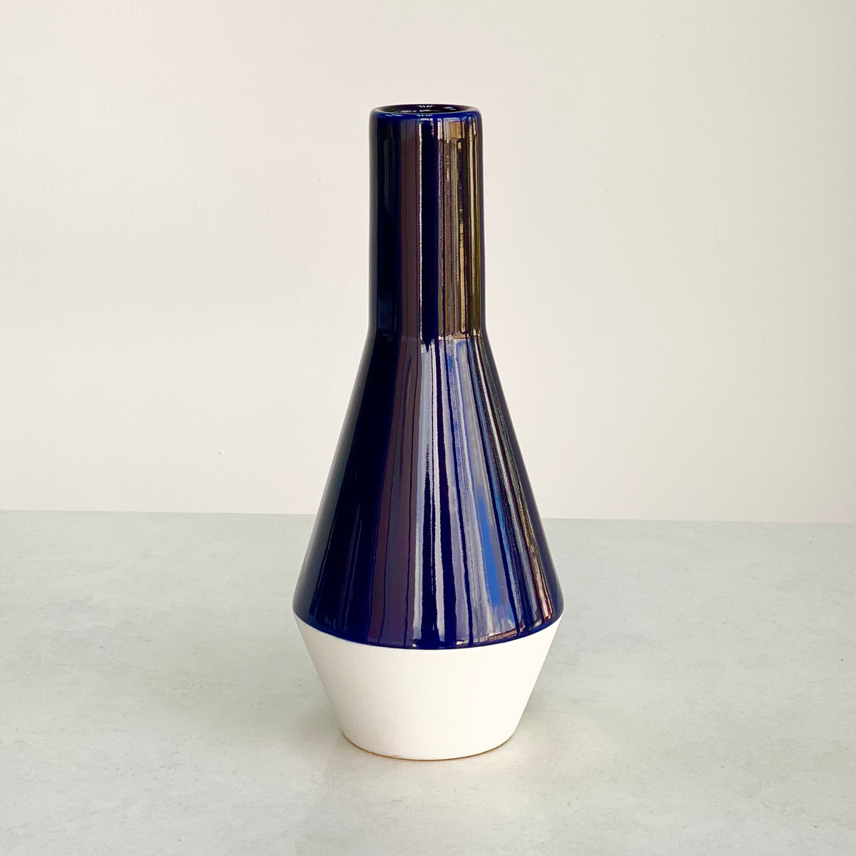 Round Curved White and Dark Blue Vase