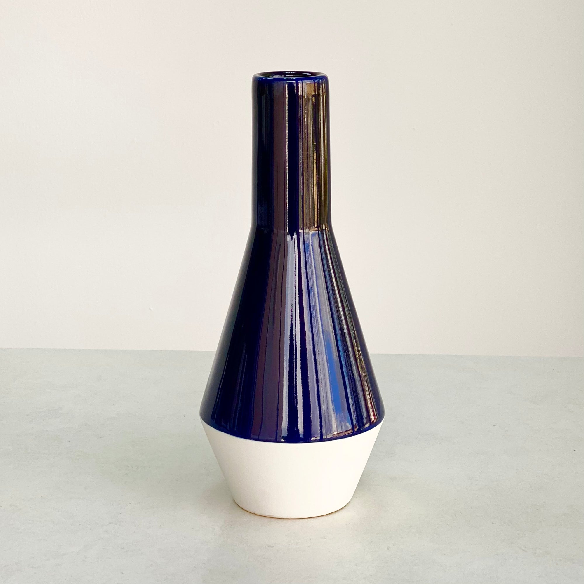 Round Curved White and Dark Blue Vase