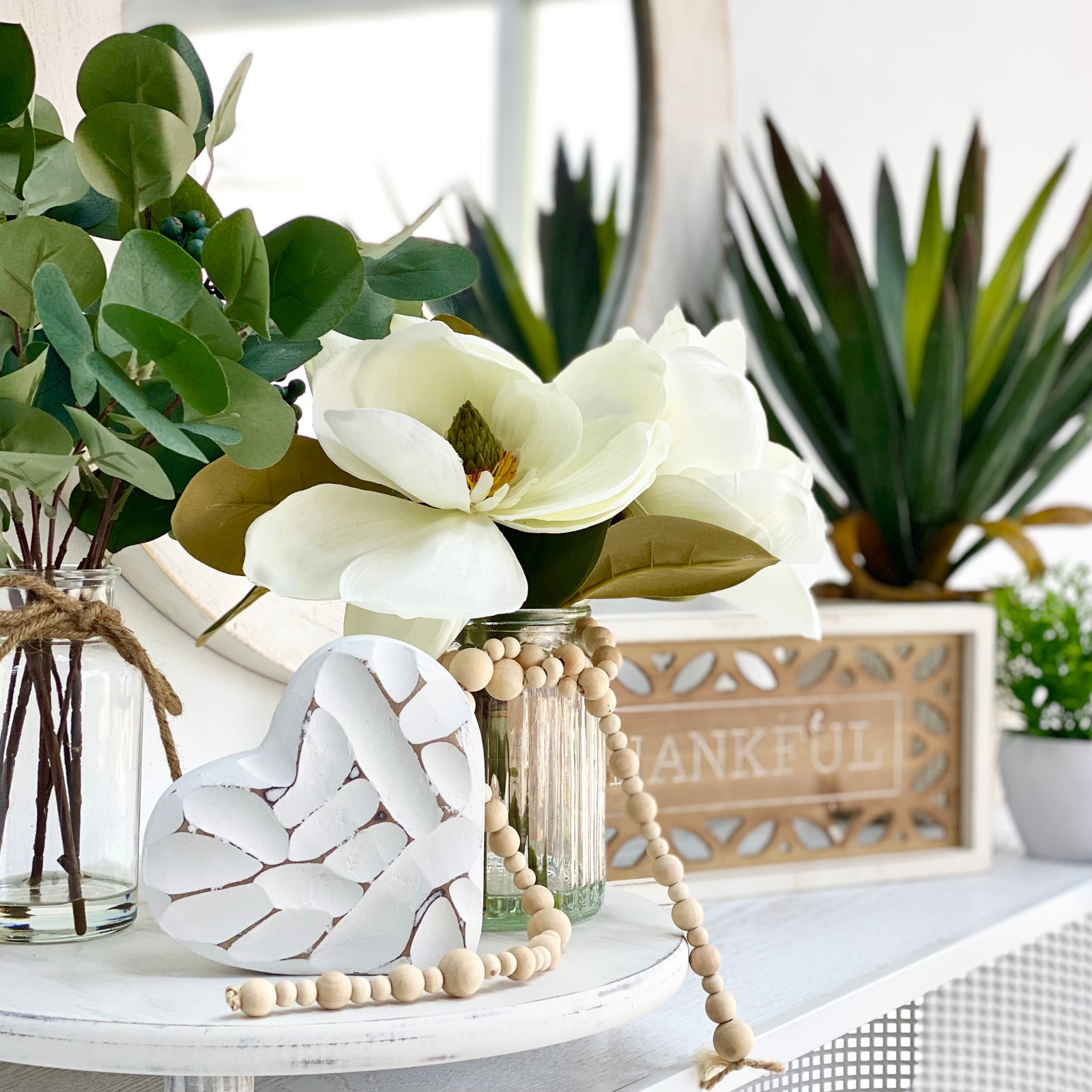 Magnolia in Glass Pot